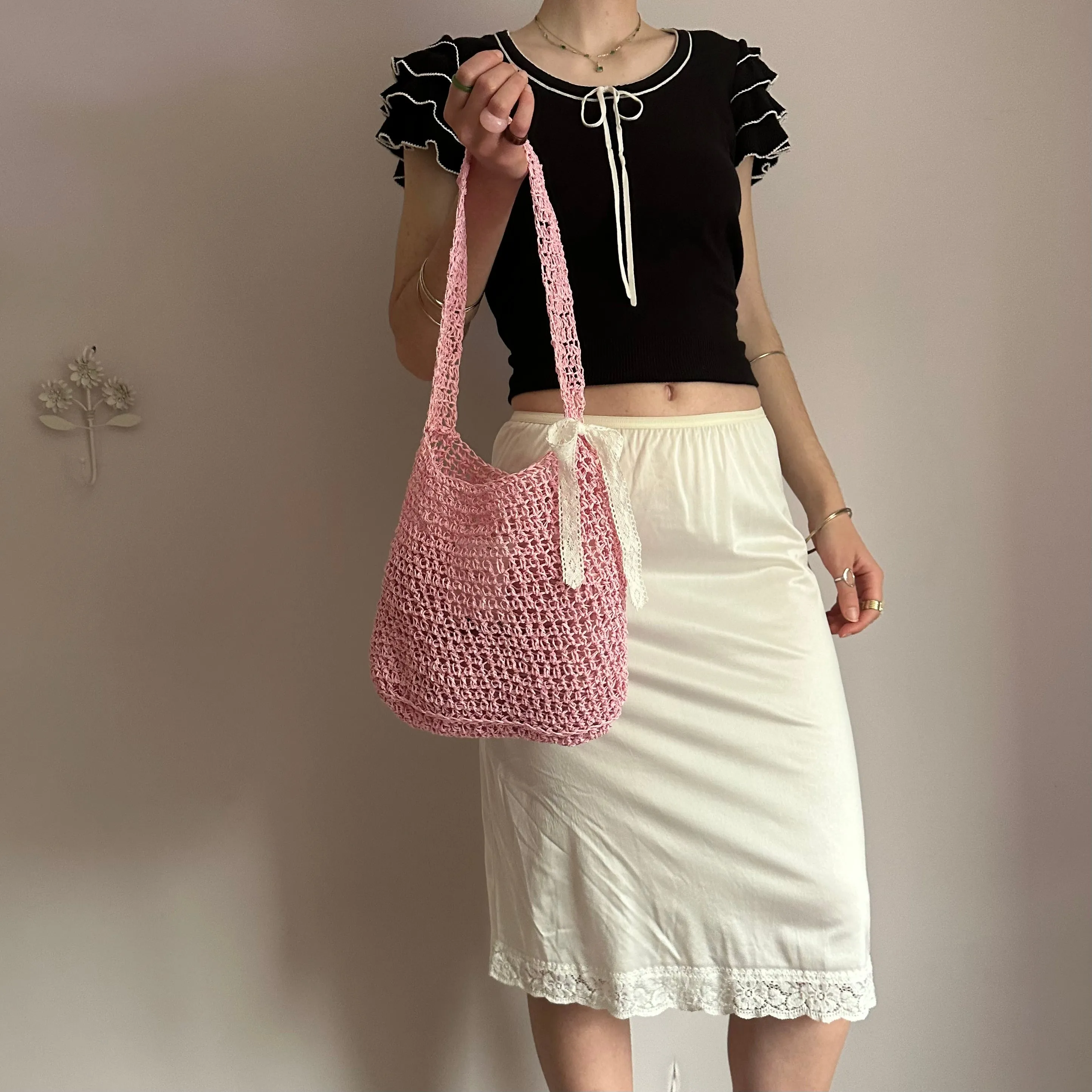 Handmade baby pink crochet straw bag with white lace bow