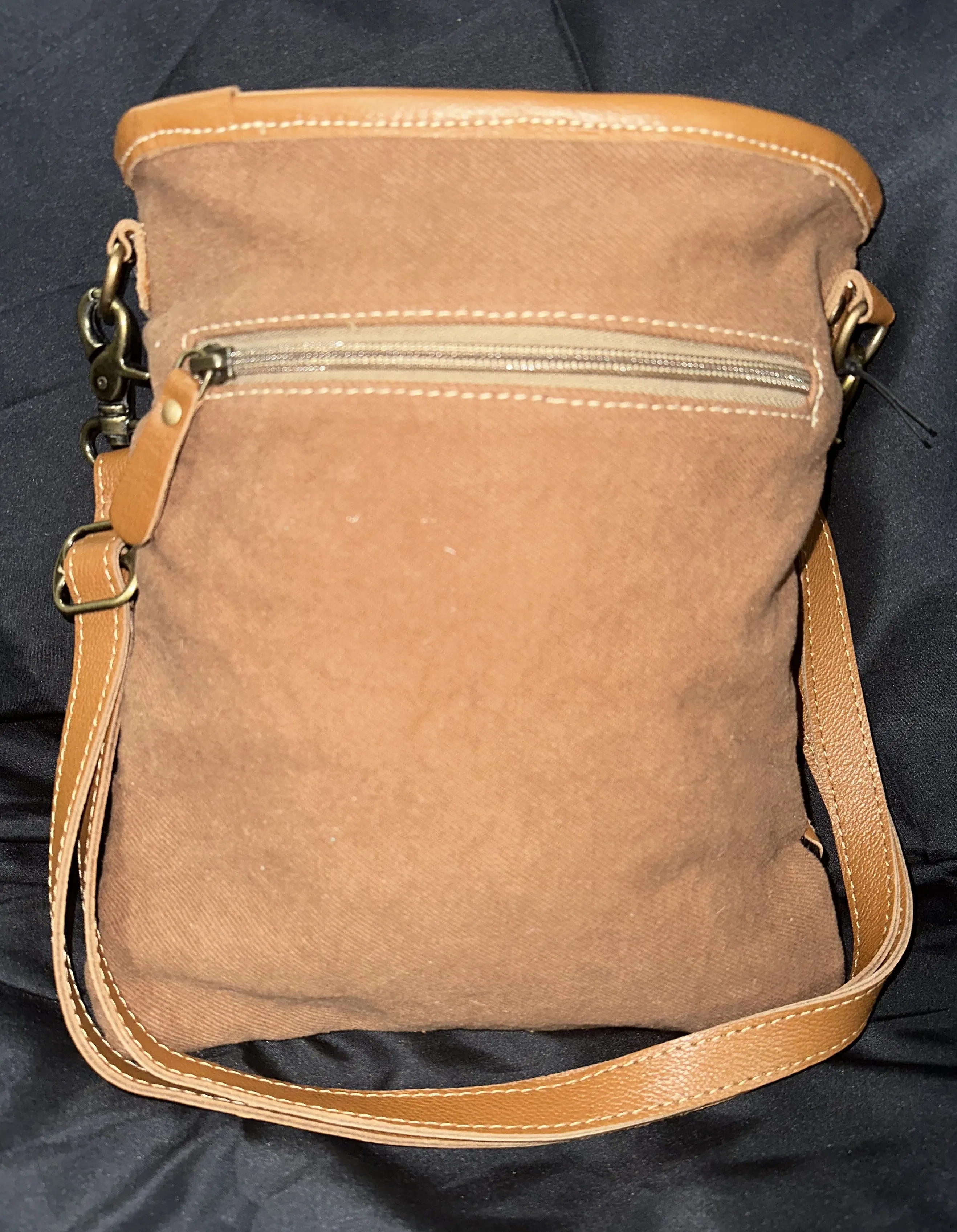 Myra Bag: "DAKOTA PLAINS HAIR-ON HIDE CANVAS BAG"