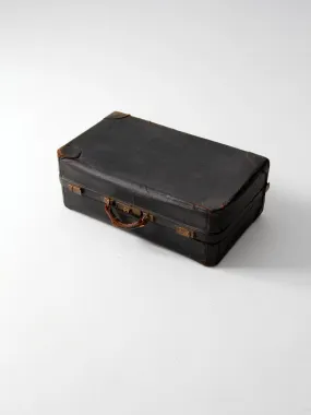 vintage black leather suitcase circa 1930s