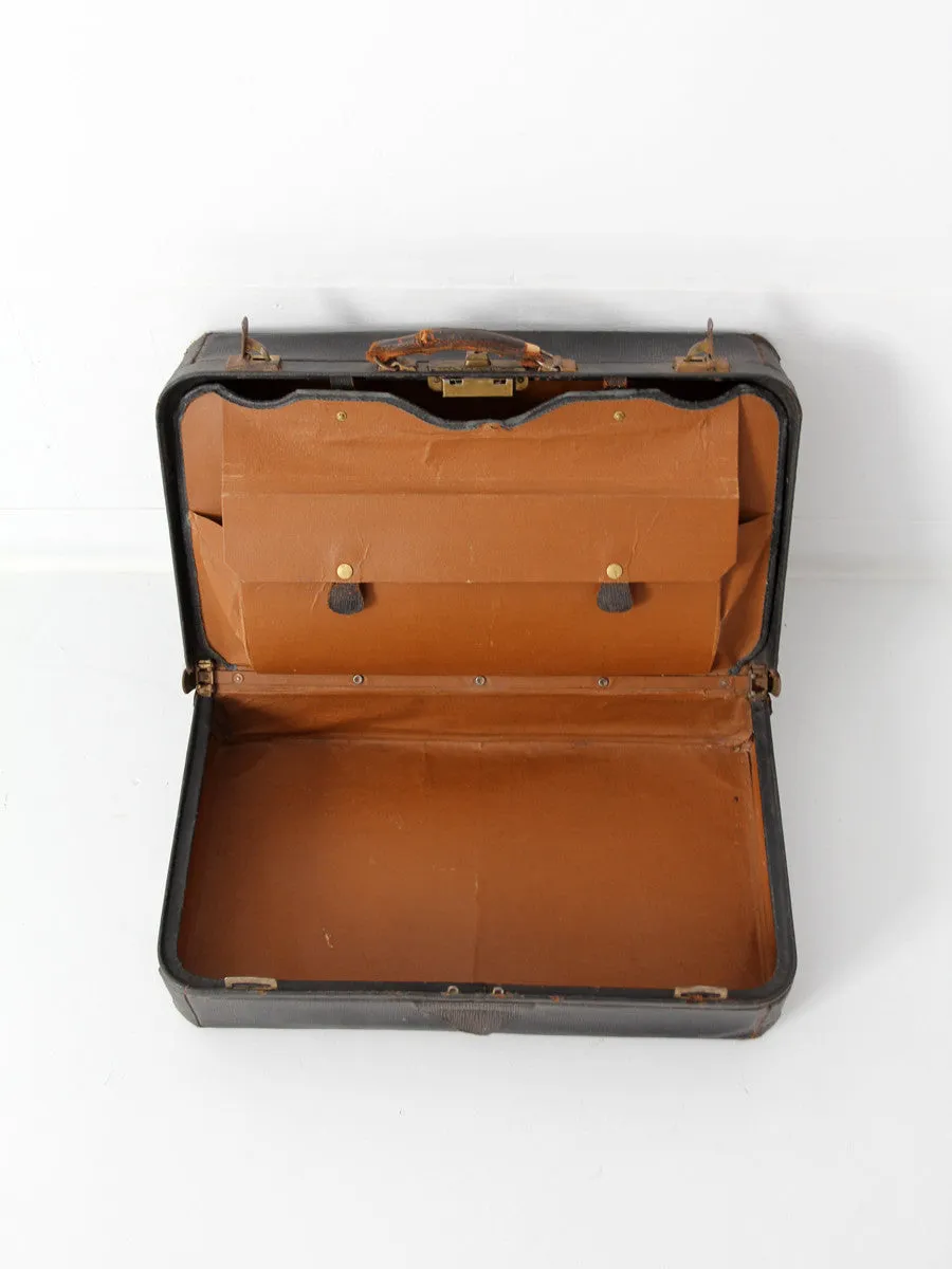 vintage black leather suitcase circa 1930s