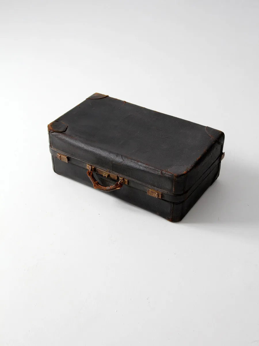 vintage black leather suitcase circa 1930s