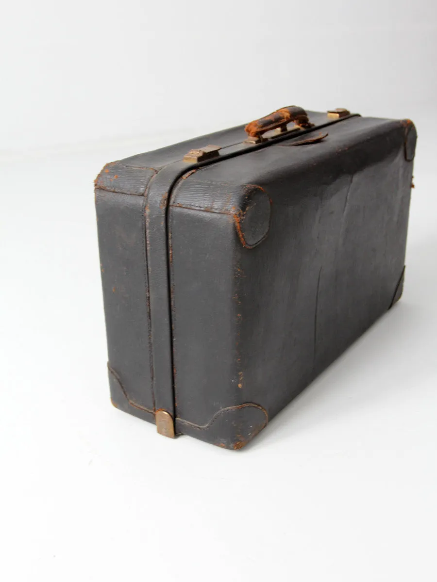 vintage black leather suitcase circa 1930s